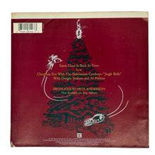 Load image into Gallery viewer, • Dwight Yoakam : SANTA CLAUS IS BACK IN TOWN/ Dwight Yoakim and Al Perkins : CHRISTMAS EVE WITH THE BABYLONIAN COWBOYS

