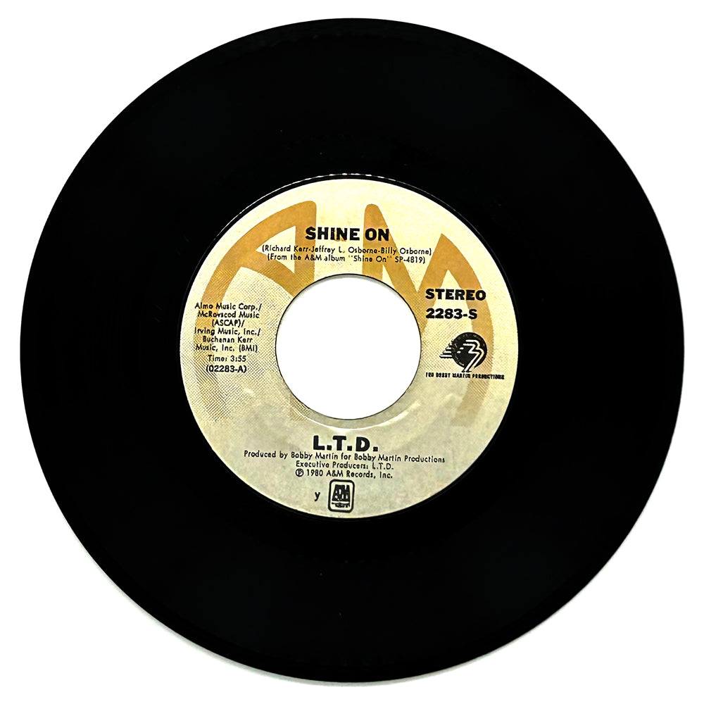 L.T.D. : SHINE ON/ LOVE IS WHAT YOU NEED