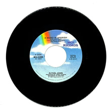 Load image into Gallery viewer, Elton John : A WORD IN SPANISH/ HEAVY TRAFFIC
