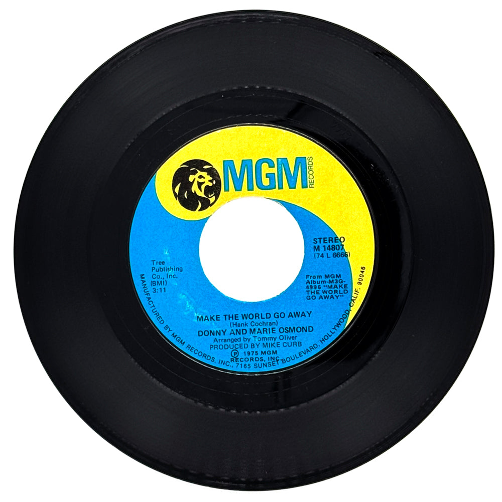 Donny and Marie Osmond : MAKE THE WORLD GO AWAY/ LIVING ON MY SUSPICION