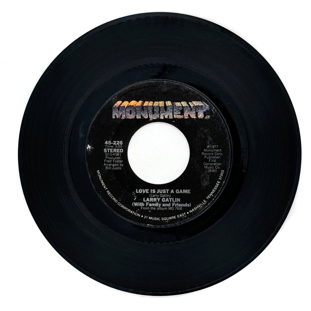 Larry Gatlin (with Family and Friends) : LOVE IS JUST A GAME/ EVERYTIME A PLANE FLIES OVER OUR HOUSE