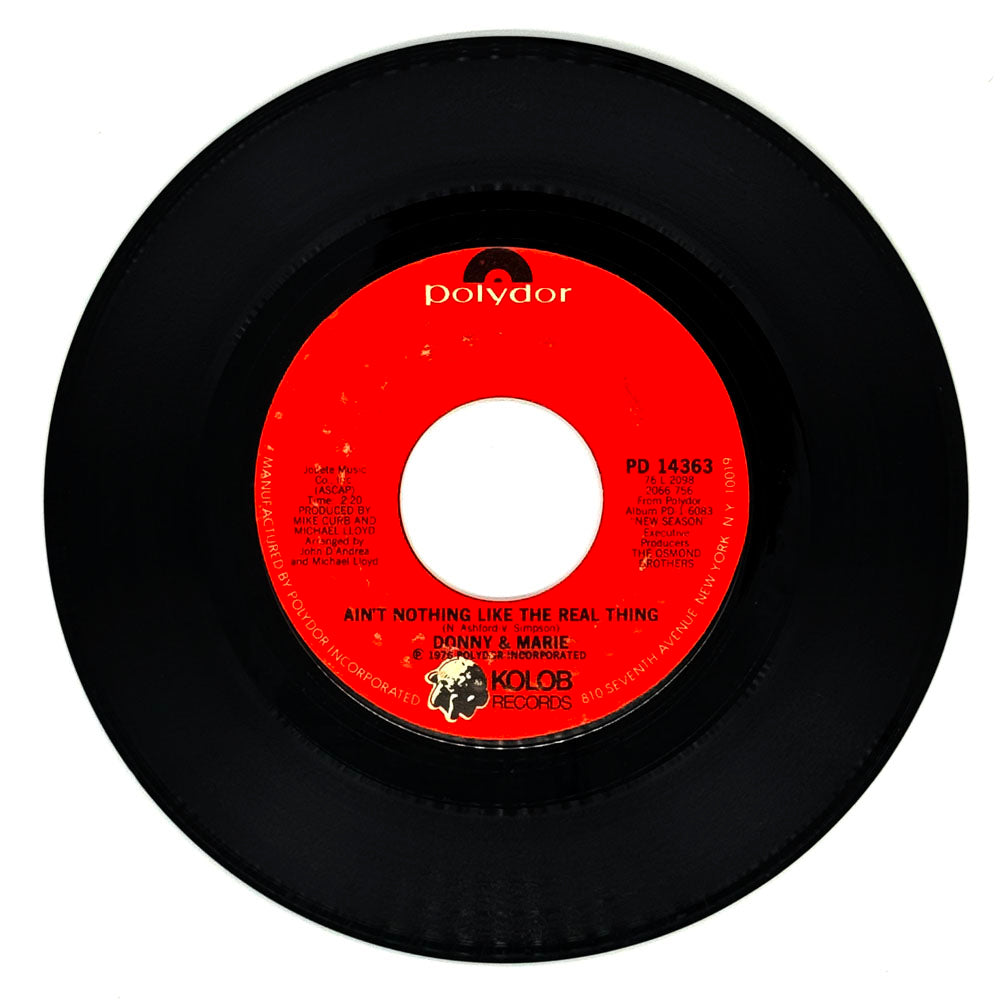 Donny & Marie : AIN'T NOTHING LIKE THE REAL THING/ SING