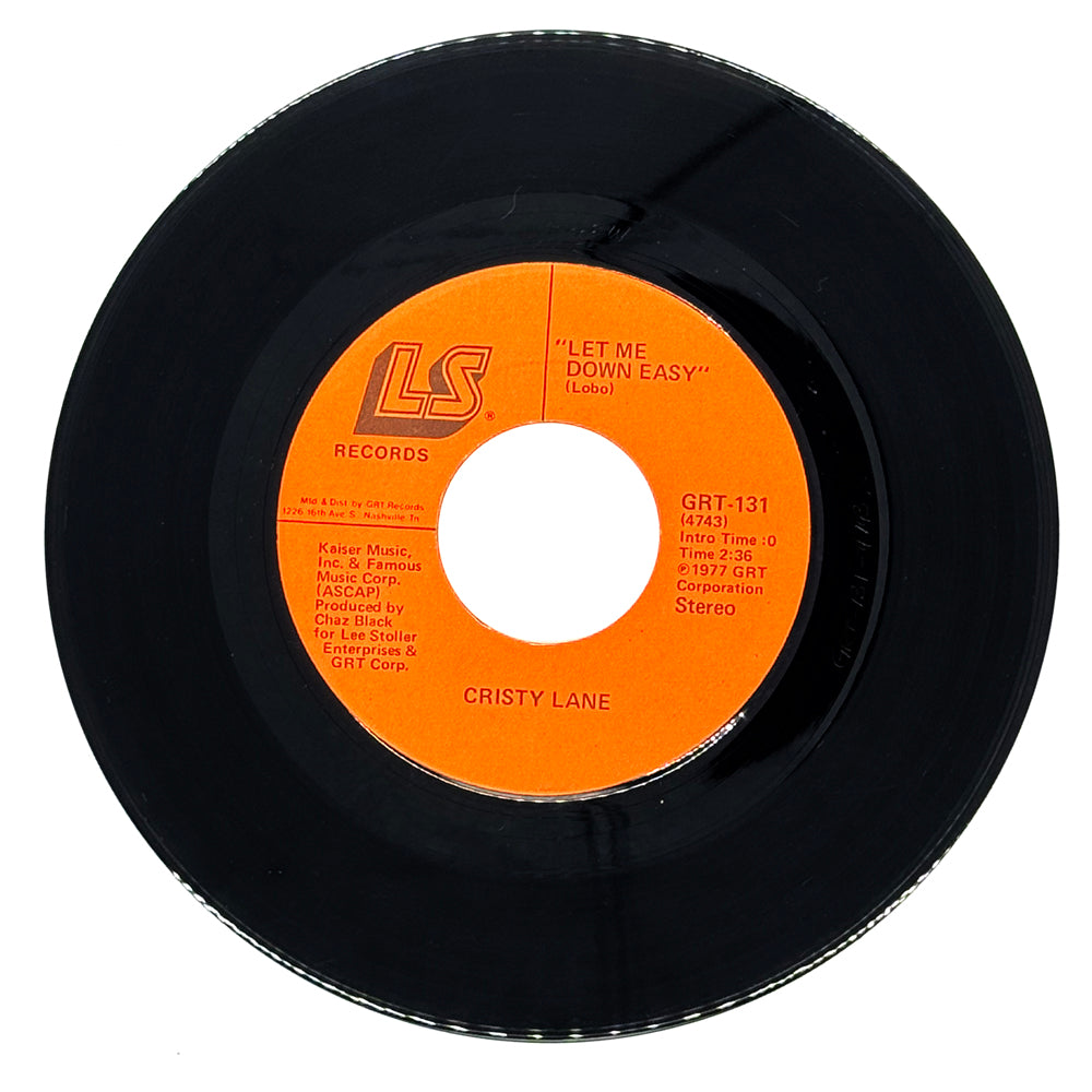 Cristy Lane : LET ME DOWN EASY/ THIS IS THE FIRST TIME (I'VE SEEN THE LAST TIME ON YOUR FACE)