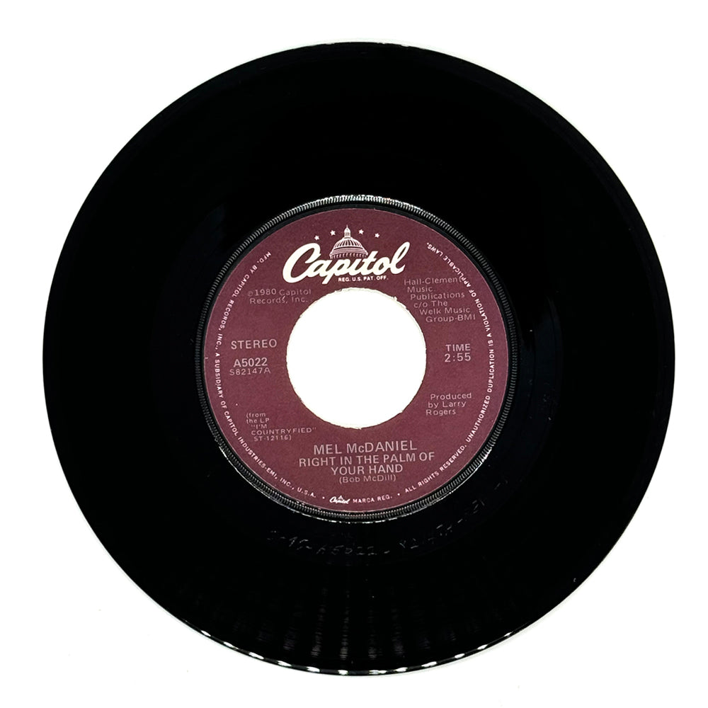 Mel McDaniel : RIGHT IN THE PALM OF YOUR HAND/ WHO'S BEEN SLEEPING IN MY BED