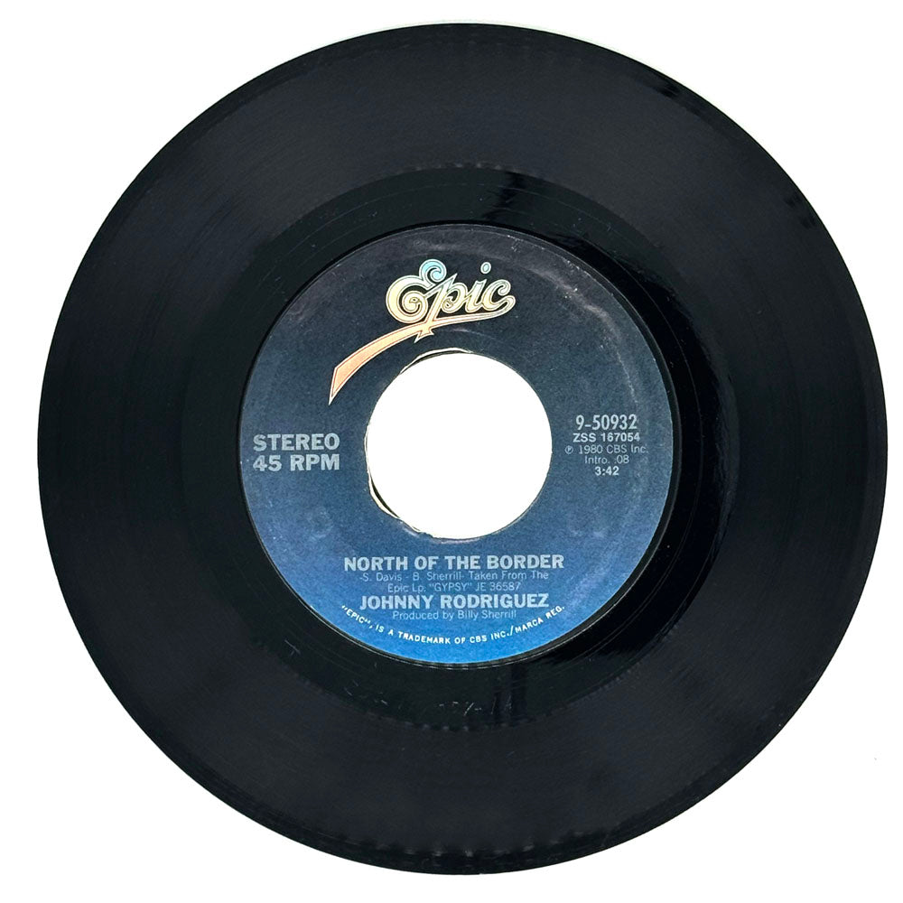 Johnny Rodriguez : NORTH OF THE BORDER/ WHEN SHE GETS AROUND TO ME