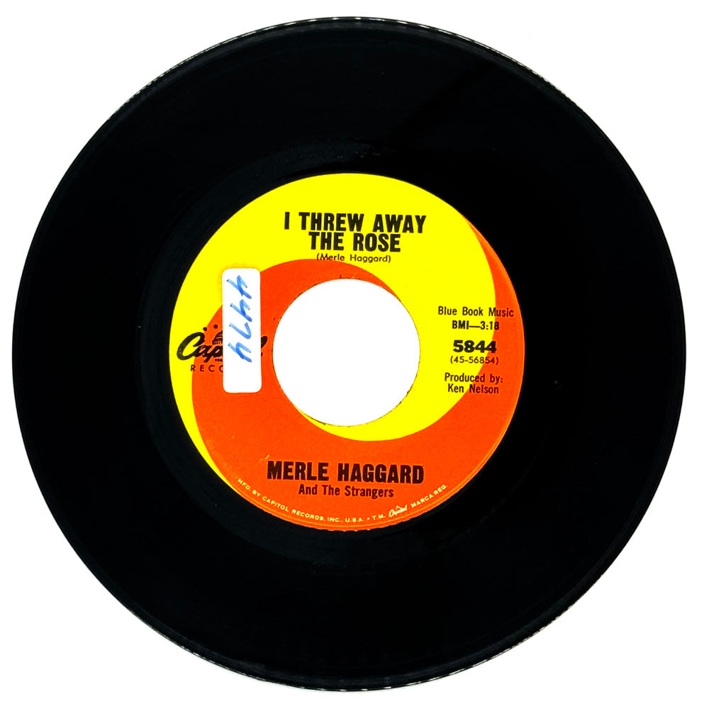 Merle Haggard And The Strangers : I THREW AWAY THE ROSE/ LONELINESS IS EATING ME ALIVE