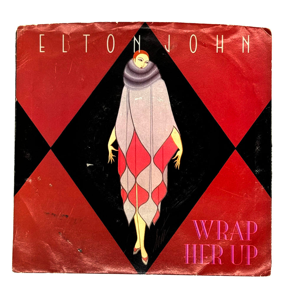 • Elton John : WRAP HER UP/ THE MAN WHO NEVER DIED