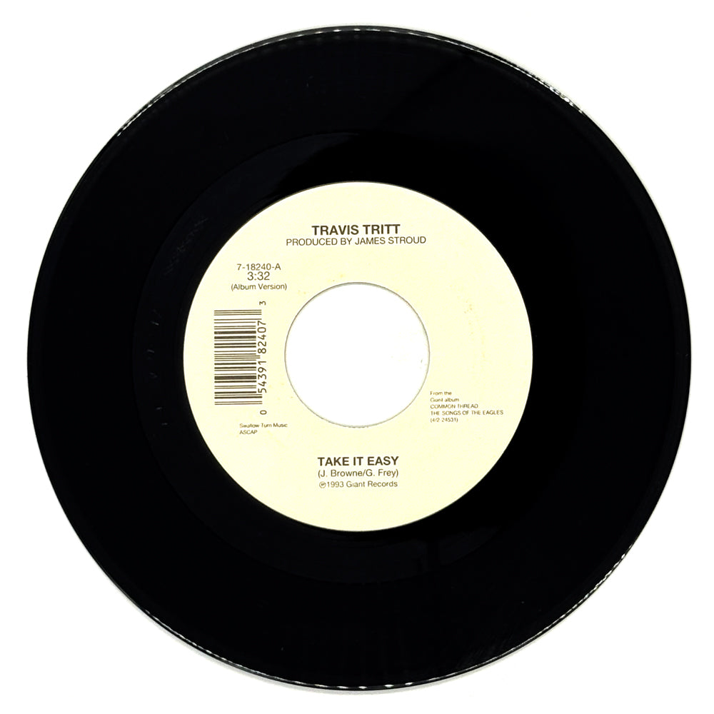 Travis Tritt : TAKE IT EASY/ I WISH I COULD GO BACK HOME