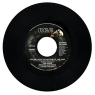 Judds, The : ROCKIN' WITH THE RHYTHM OF THE RAIN/ RIVER ROLL ON
